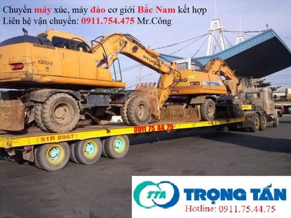 Xe fooc chở máy xúc